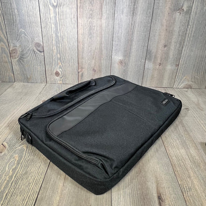 Black KIZUNA laptop bag case for 17.3" laptops, featuring a sleek design and durable material, ideal for travel and work.