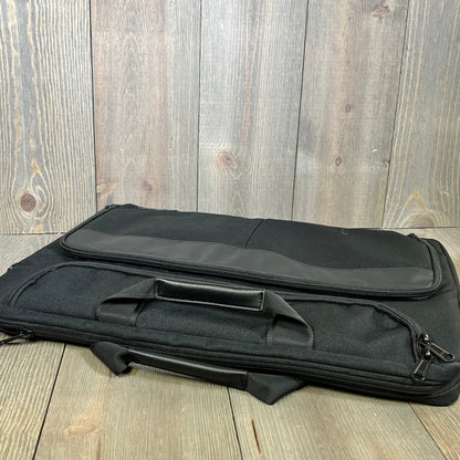 Black KIZUNA 17-inch laptop bag with dual handles and front pocket, perfect for Legion, MSI, Dell, HP, and more.