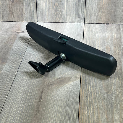 Interior rearview mirror replacement for Mazda 3, CX-3, CX-5, MX-5, OEM # KD53-69-220B, sleek design on wooden background.
