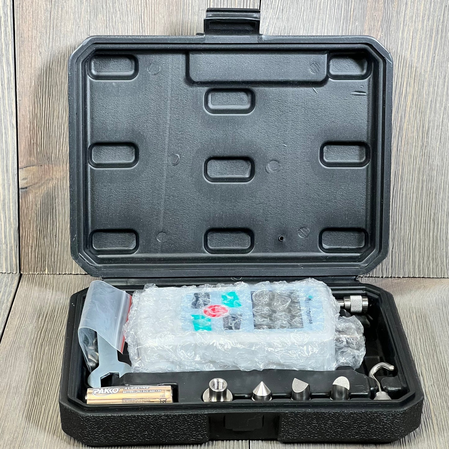Portable Mxmoonfree 500N Digital Force Gauge in protective storage case, ideal for mechanical physics labs.