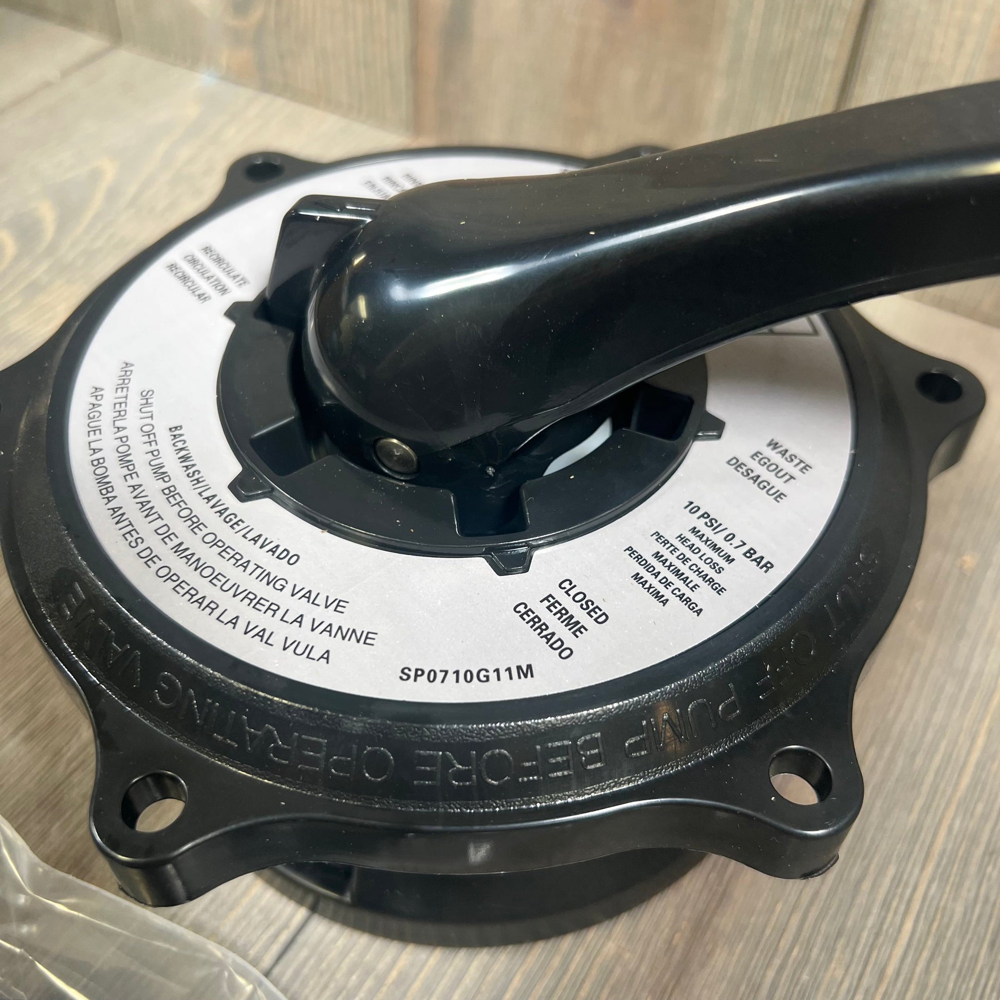 Black Hayward-compatible key cover and handle assembly with gasket visible, ideal for multiport valves.