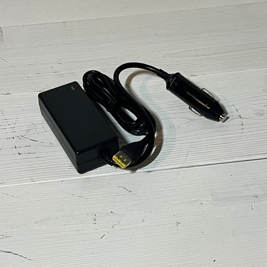Black 12V car adapter for Resmed Airsense 11, featuring a long cord and sleek design, perfect for CPAP users on the go.