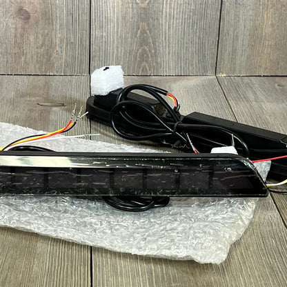 LED rear reflector bumper fog light assembly for 2020-2023 Ford Explorer, shown with wiring and packaging.