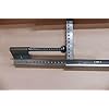 15" garage door plunger bumper pusher spring for opener system, durable metal with precise measurement markings.