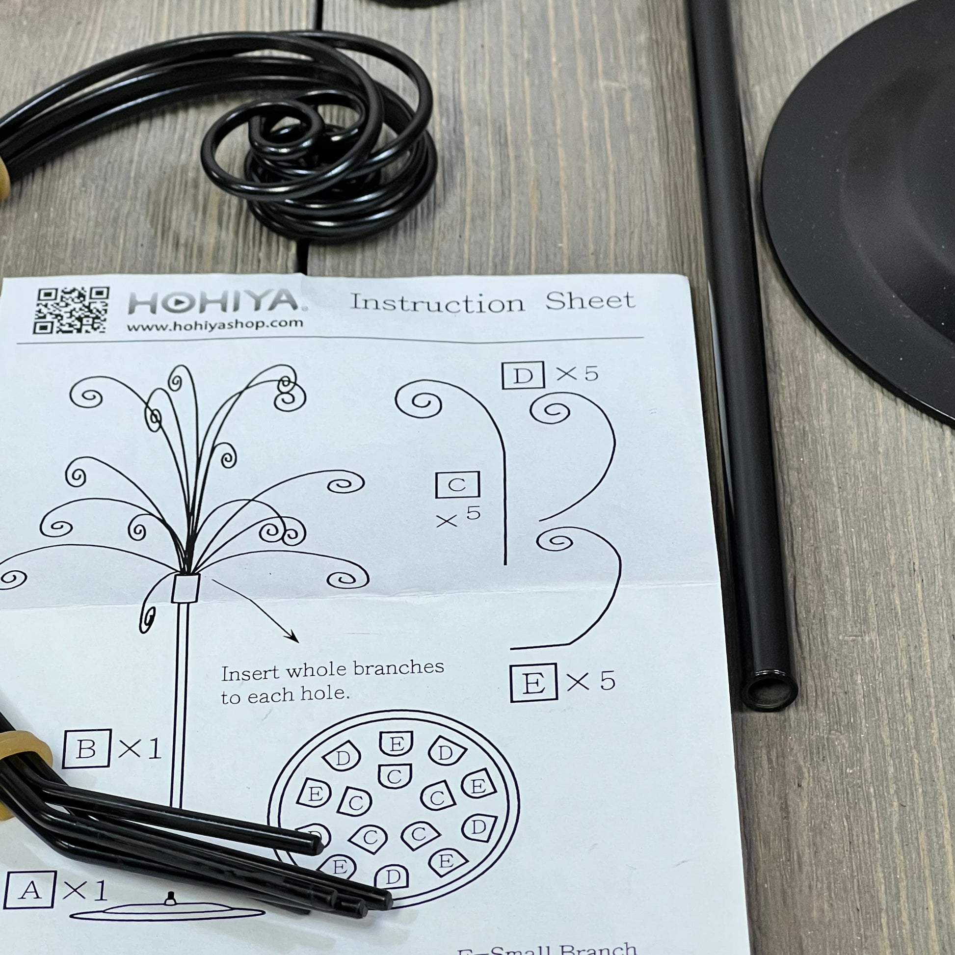 HOHIYA ornament tree display stand assembly instructions, showing wire hooks and components for hanging Christmas decorations.
