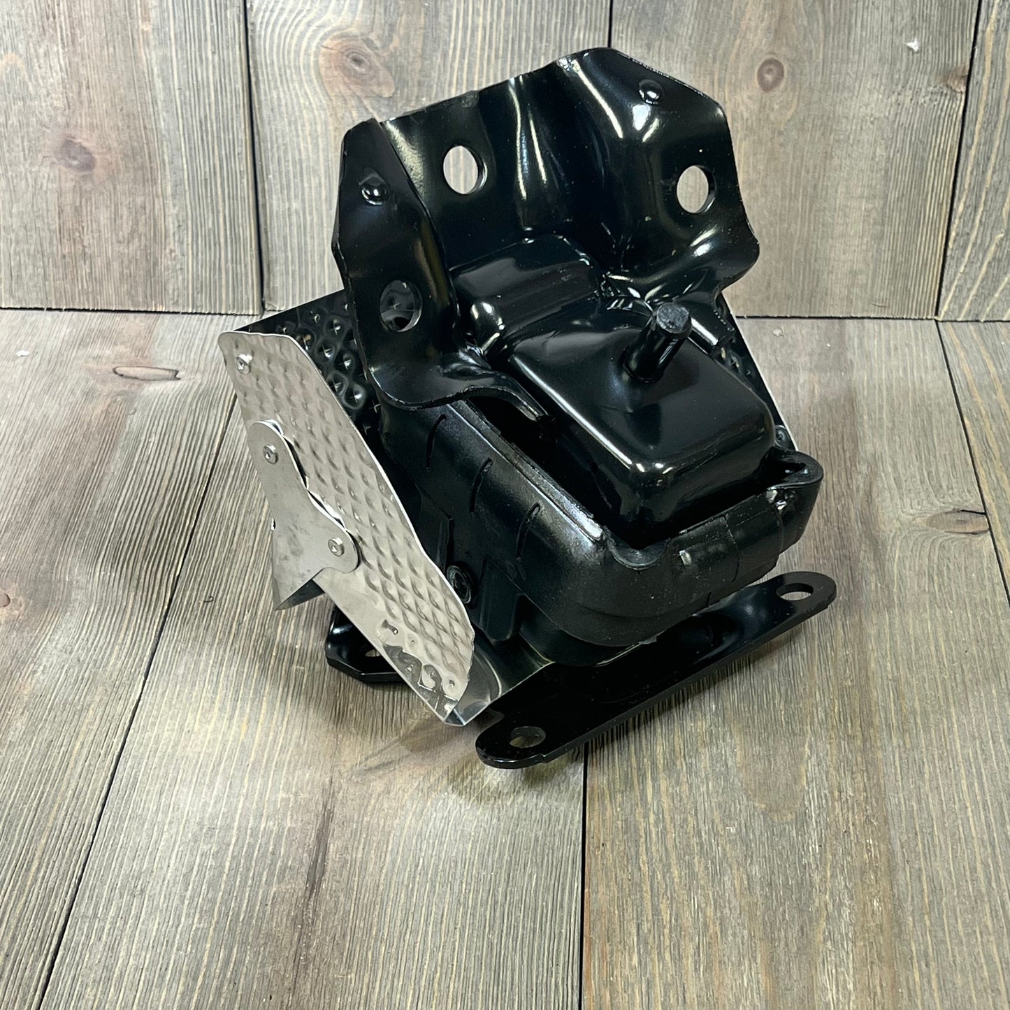 Engine motor mount for 2007-2014 Tahoe, Silverado, Suburban; durable black metal, compatible with right or left side installation.