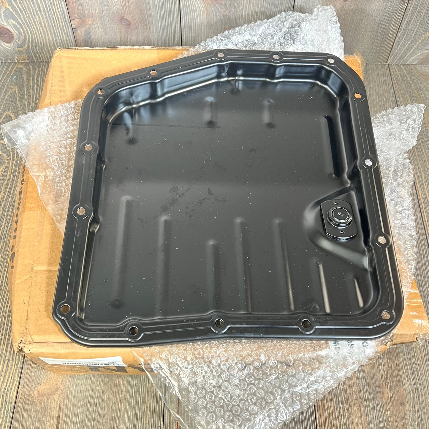 Premium transmission oil pan sump with drain plug, compatible with Toyota Camry, Celica, Corolla, Tercel models.