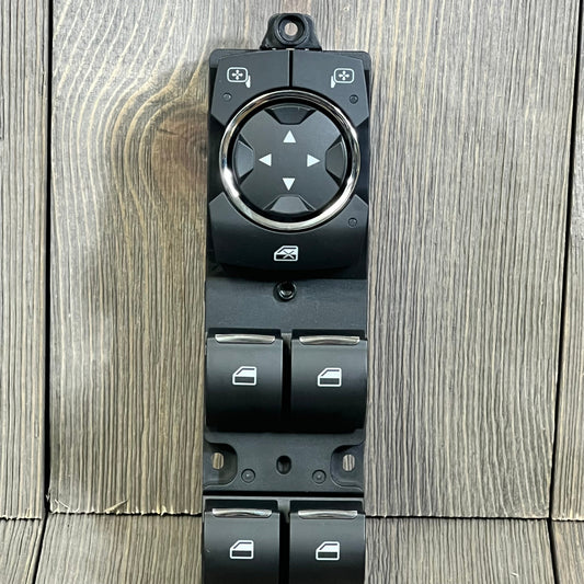 Black Motoforti power window switch for Ford models, featuring four window controls and directional buttons on wood background.