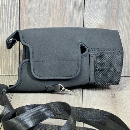 Black 40oz magnetic water bottle carrier bag with detachable shoulder strap and storage pouches, compatible with Stanley Cup.
