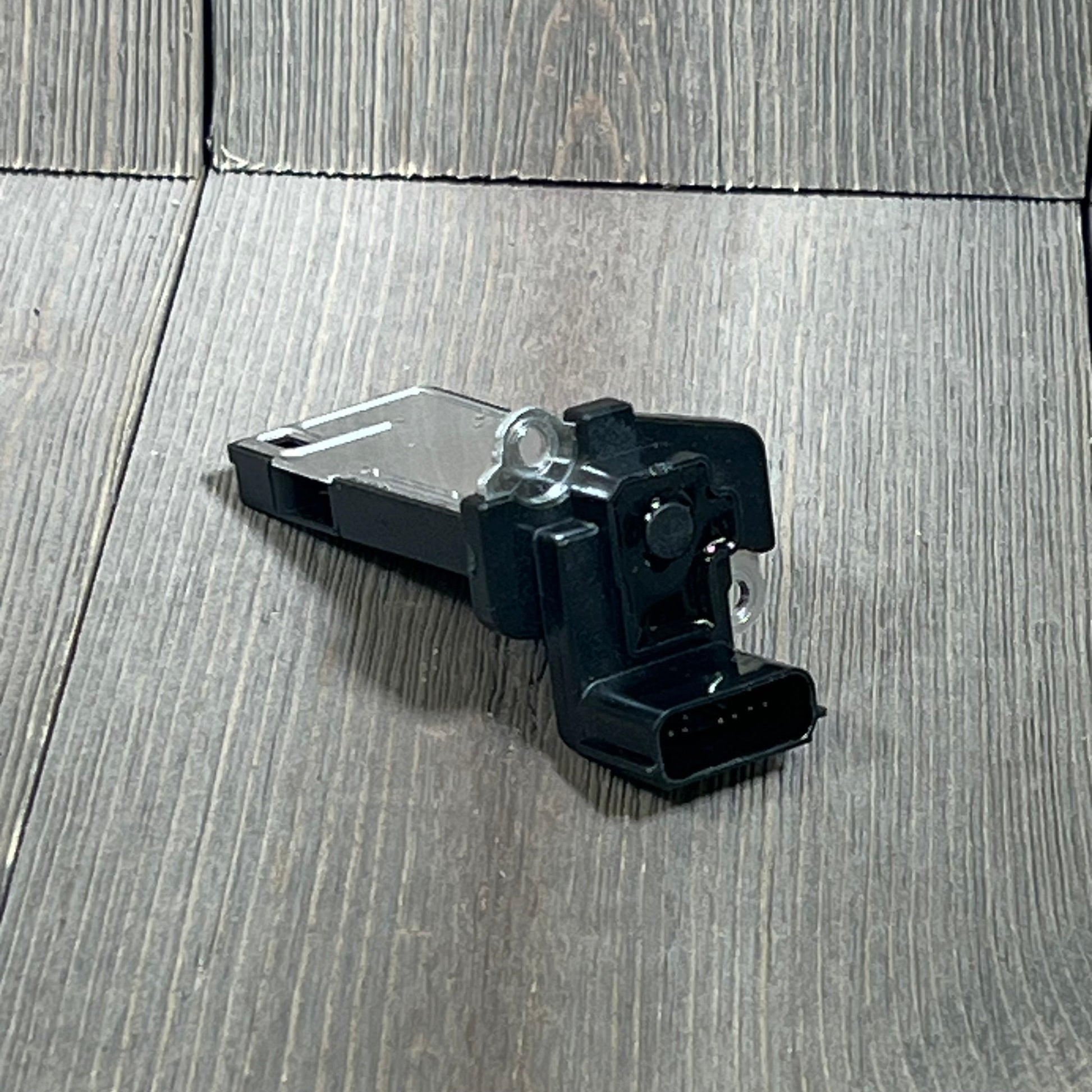 Mass Air Flow Sensor MAF compatible with Cadillac and Chevy vehicles, showcasing connector and sensor details.