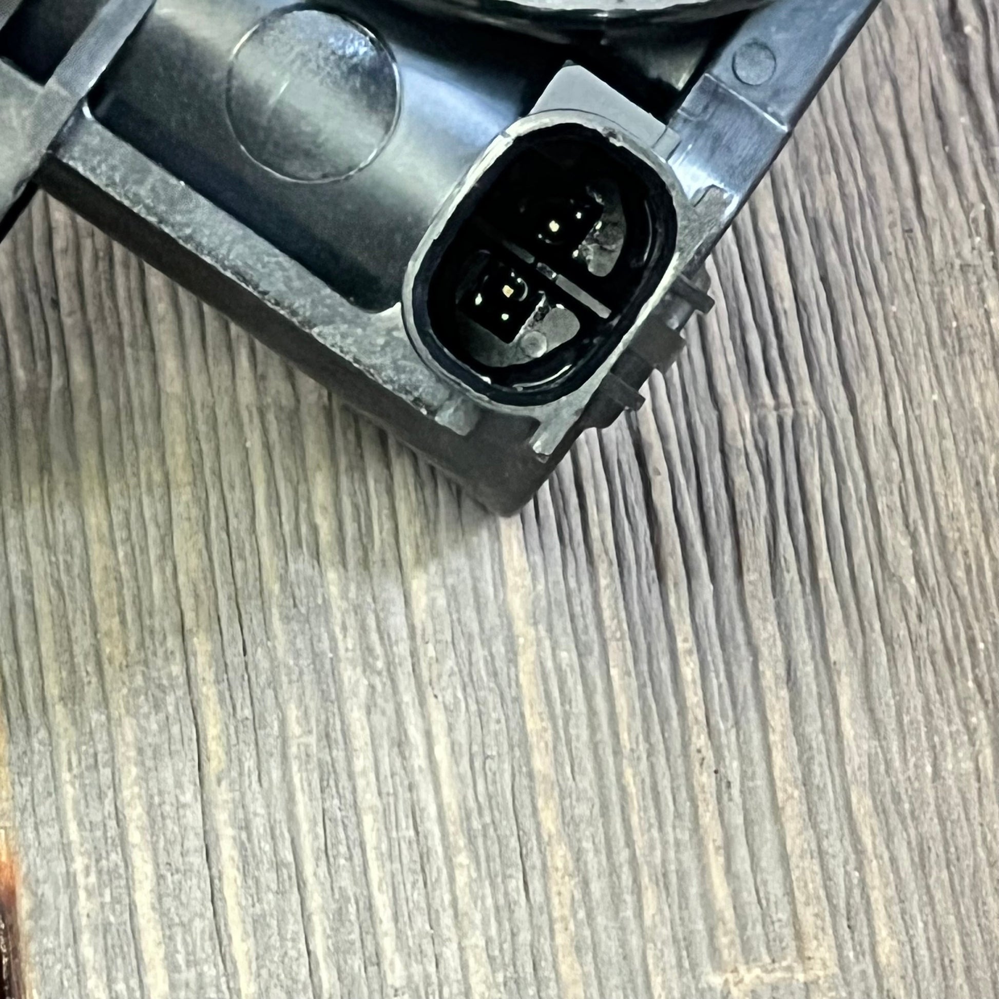 Close-up of NOVAPARTS coolant water control valve for Toyota Corolla and Lexus UX200, showcasing connector detail.