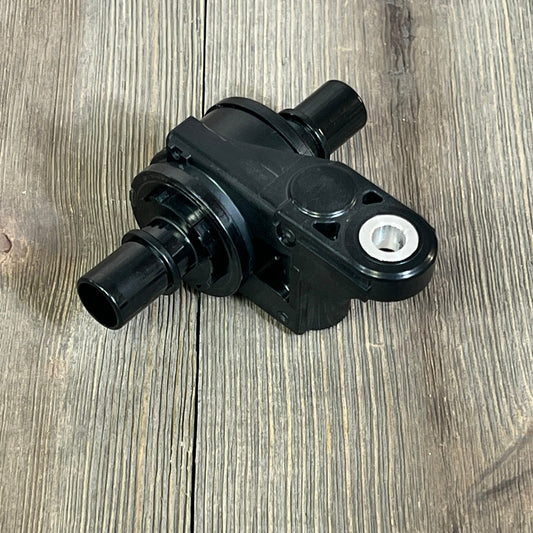 NOVAPARTS coolant water control valve for Toyota Corolla and Lexus UX200, black finish, on wooden surface.