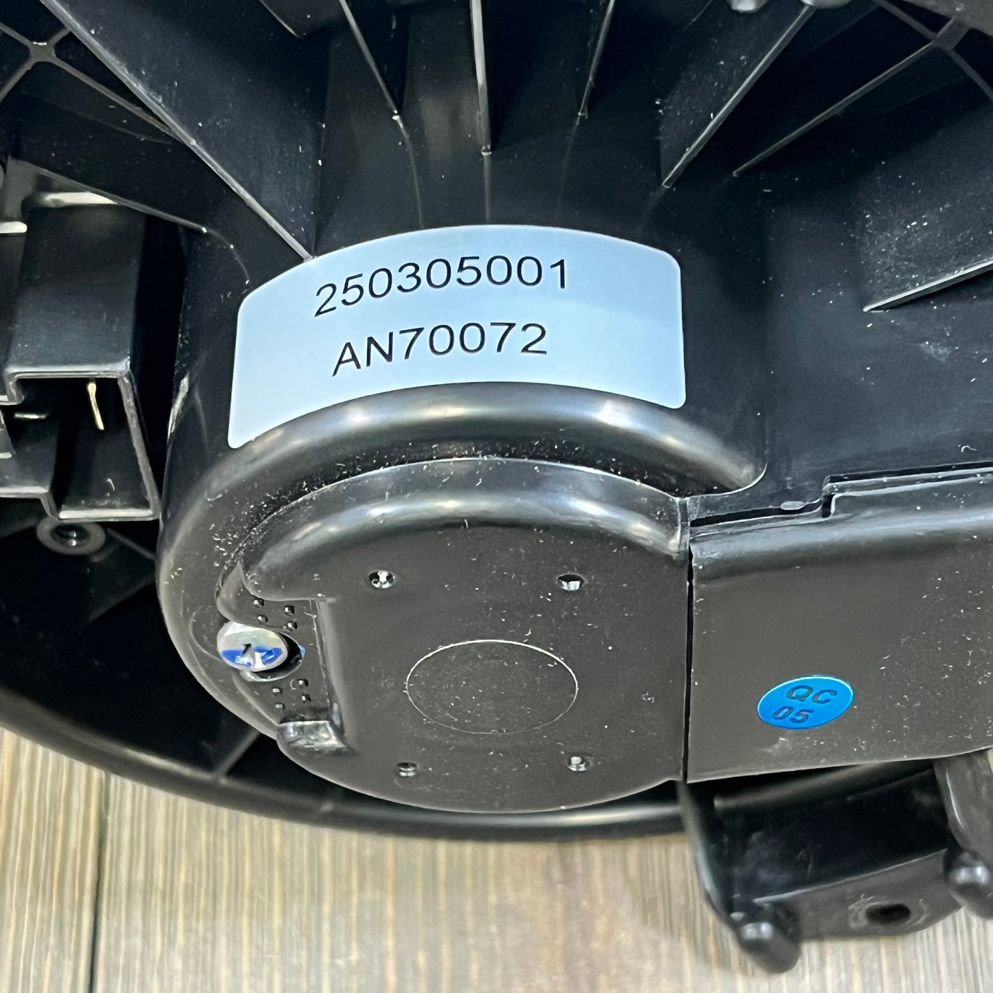 Close-up of 1045816663-A-NAFTULY AC Blower Motor, showing detailed model label, compatible with Honda and Acura models.