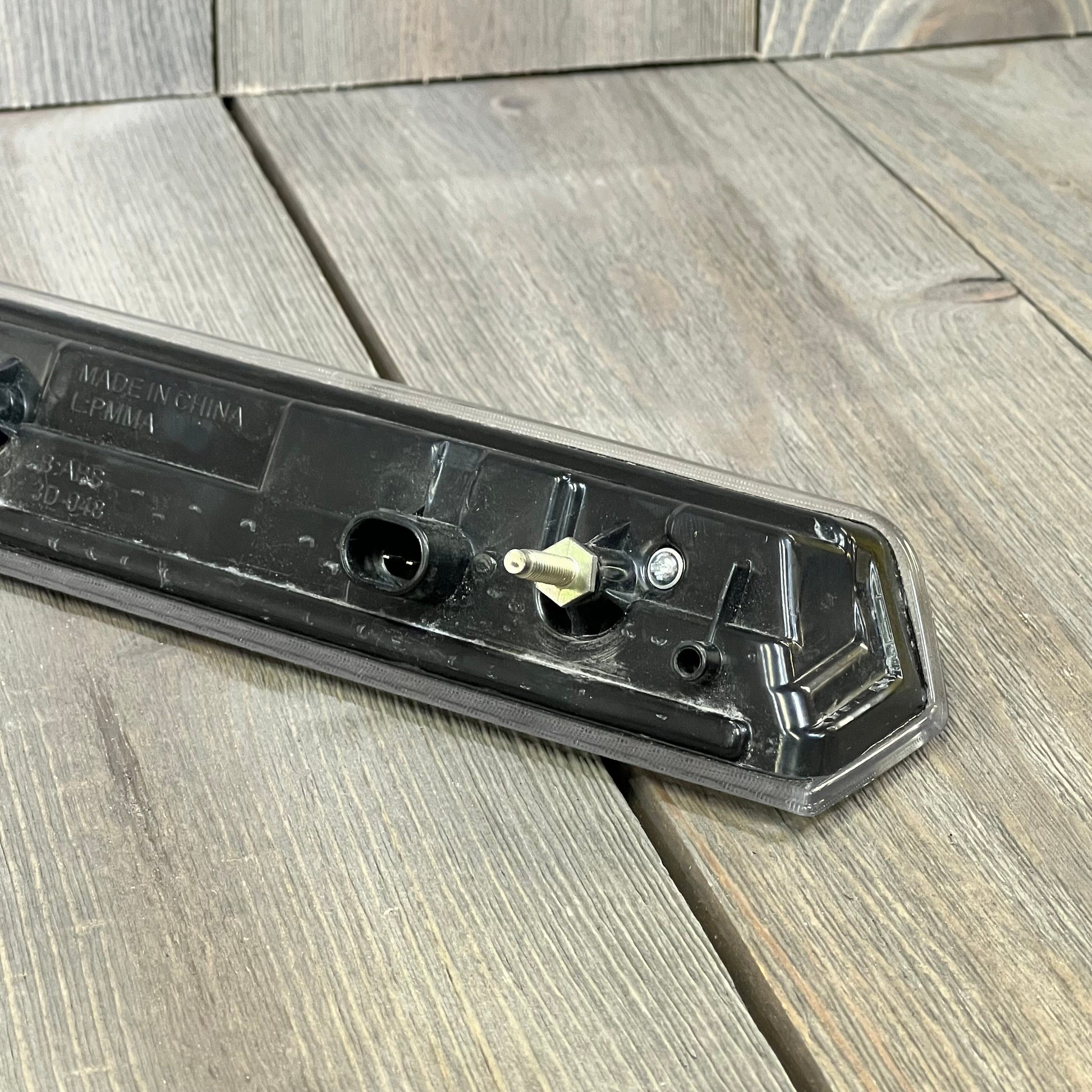 Rear view of Cxdar Third Brake Light LED assembly for 2015-2020 Chevy Tahoe, showcasing the mounting hardware.