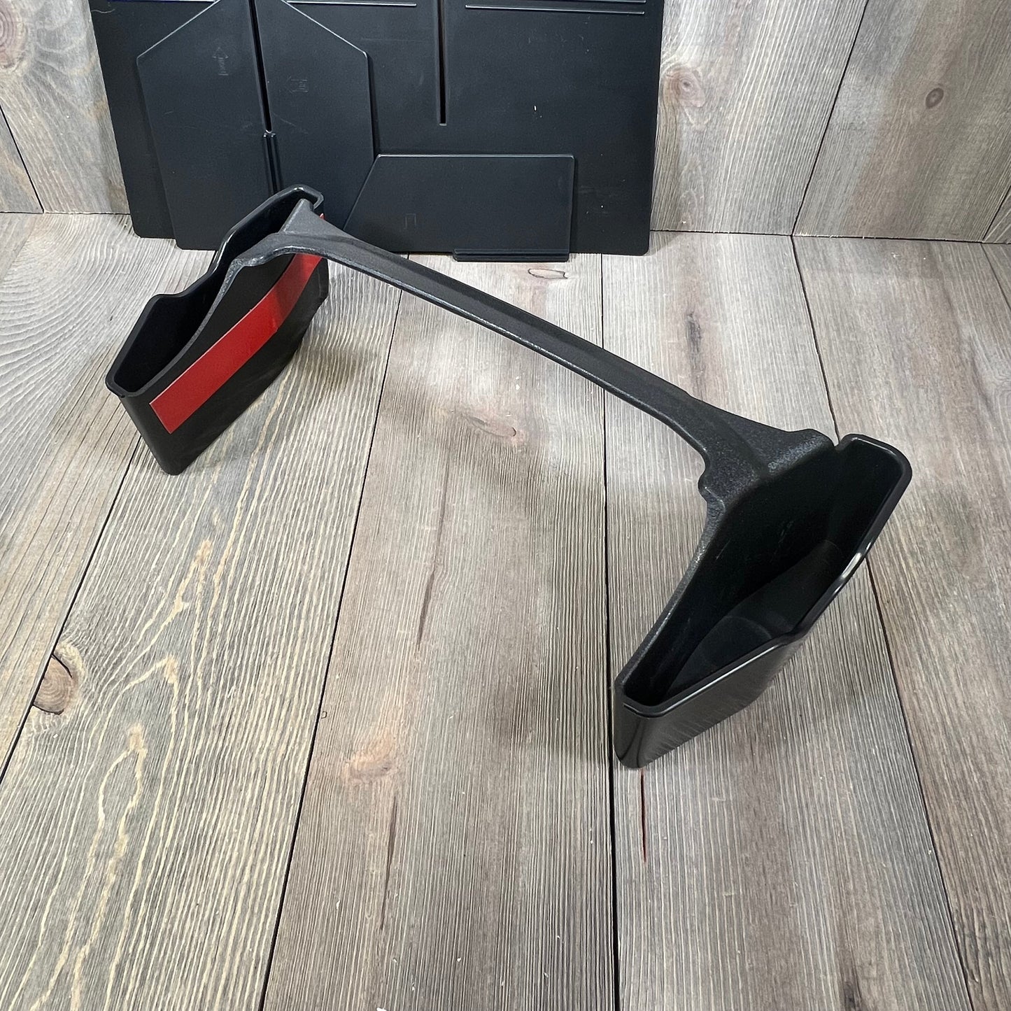 Center console organizer for Toyota 4Runner 2010-2024, showcasing durable black plastic design with red accents.