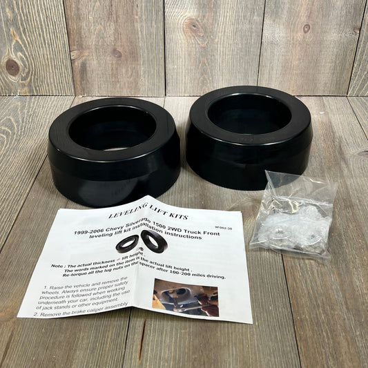 Dynofit 3" front coil spring strut spacer kit with installation guide for 1999-2006 Chevy Silverado 1500 2WD.