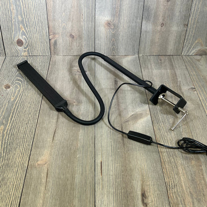 Black LIBORA LED desk lamp with flexible gooseneck and clamp, perfect for home office, study, or reading tasks.
