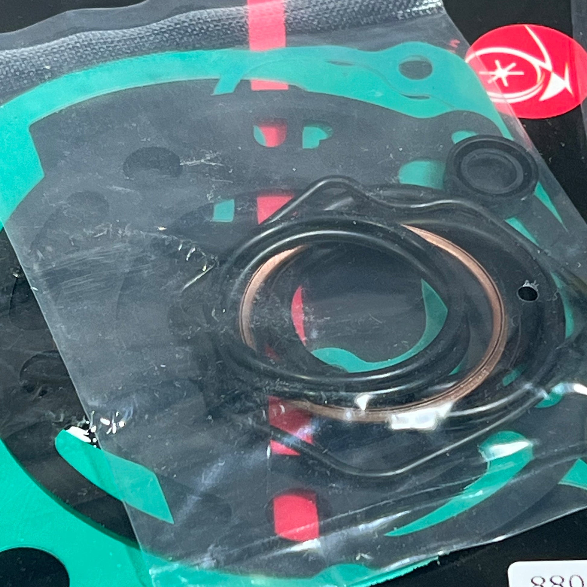 Kawasaki KX85 gasket kit with piston bearings and rings, compatible with 2001-2013 models, displayed in packaging.