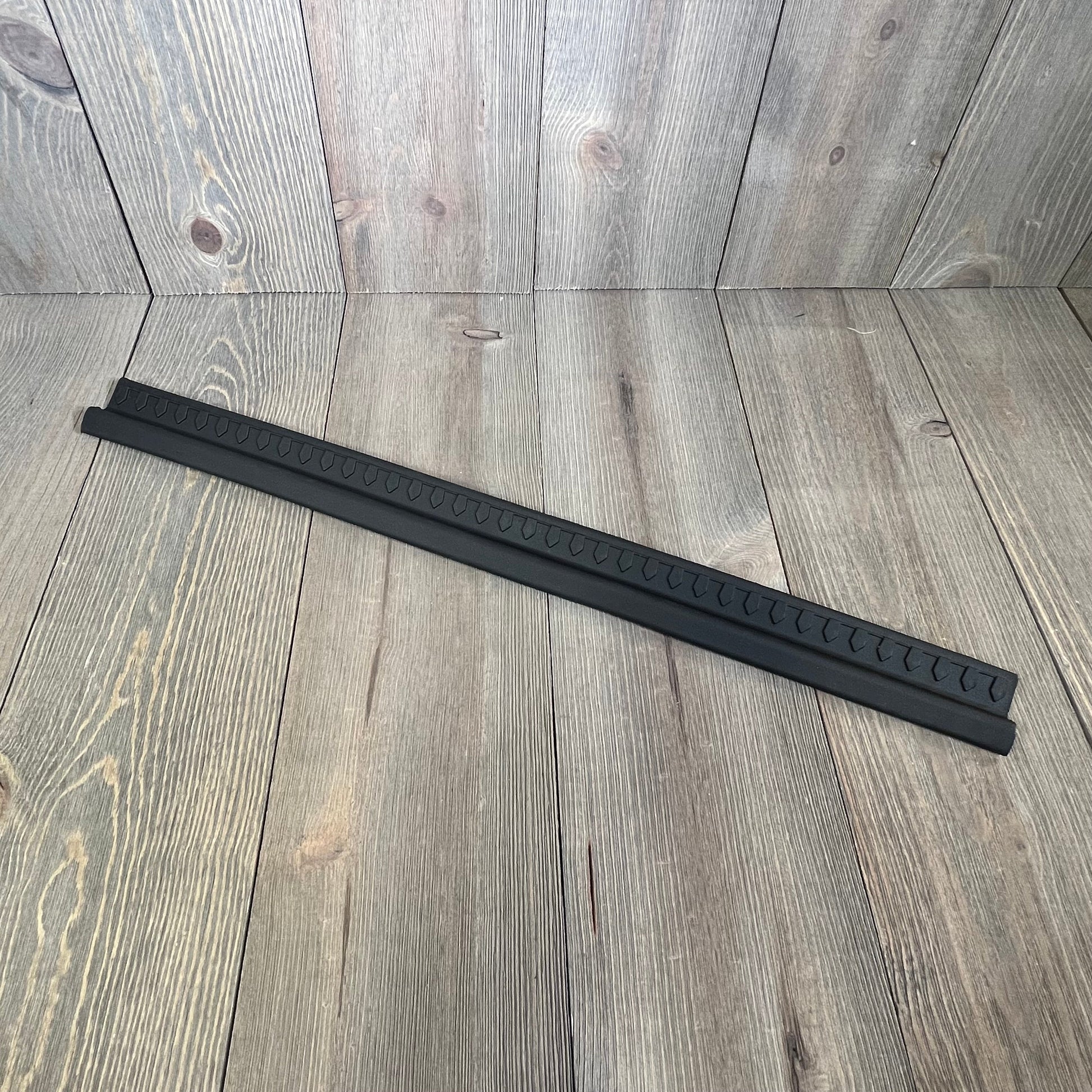 Black thermoplastic entry guard for Jeep Wrangler TJ/LJ 1997-2006, 2-piece set, durable and easy to install.