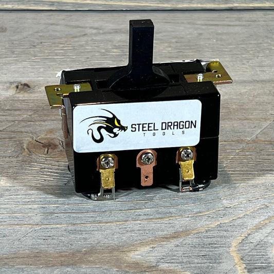 Black Steel Dragon Tools switch for Ridgid 300 and 535, featuring durable metal connectors on a wooden surface.
