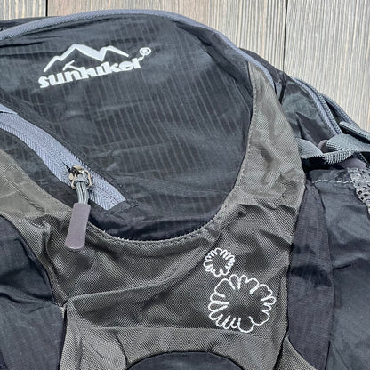 Lightweight sunhiker backpack with durable design, perfect for cycling and hiking, featuring a stylish black finish.