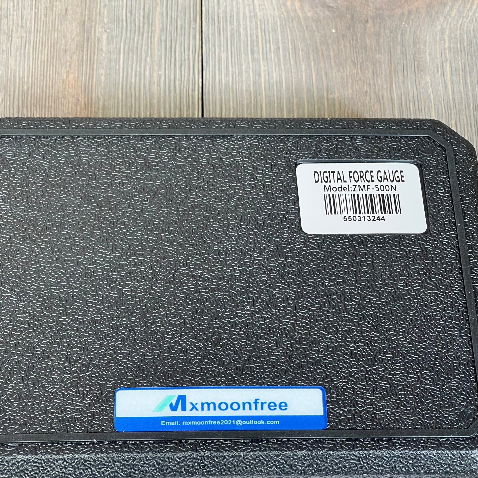 Mxmoonfree 500N Digital Force Gauge case showing model number ZMF-500N for precise mechanical physics measurements.