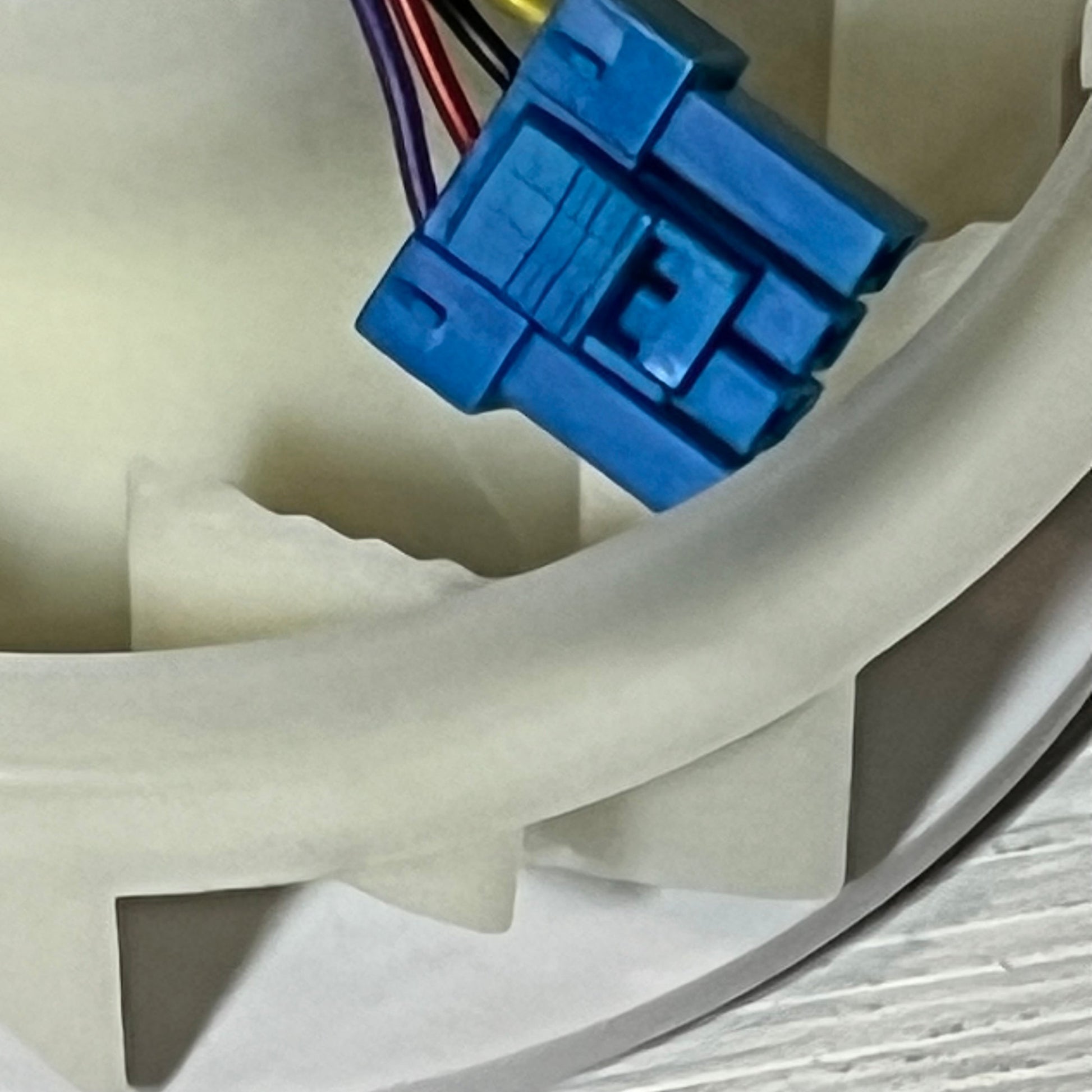 Close-up of Smtime EAU63503709 refrigerator evaporator fan motor with blue wiring connector, compatible with LG models.