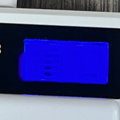 LCD display of dual charger station for rechargeable A-1 VMA4400 batteries, compatible with Arlo Pro cameras.