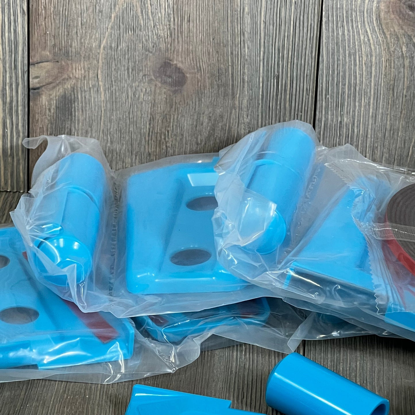 Light blue E-cowlboy door hinge cover trim set for Jeep Wrangler JK JKU 2007-2018, shown in original packaging.