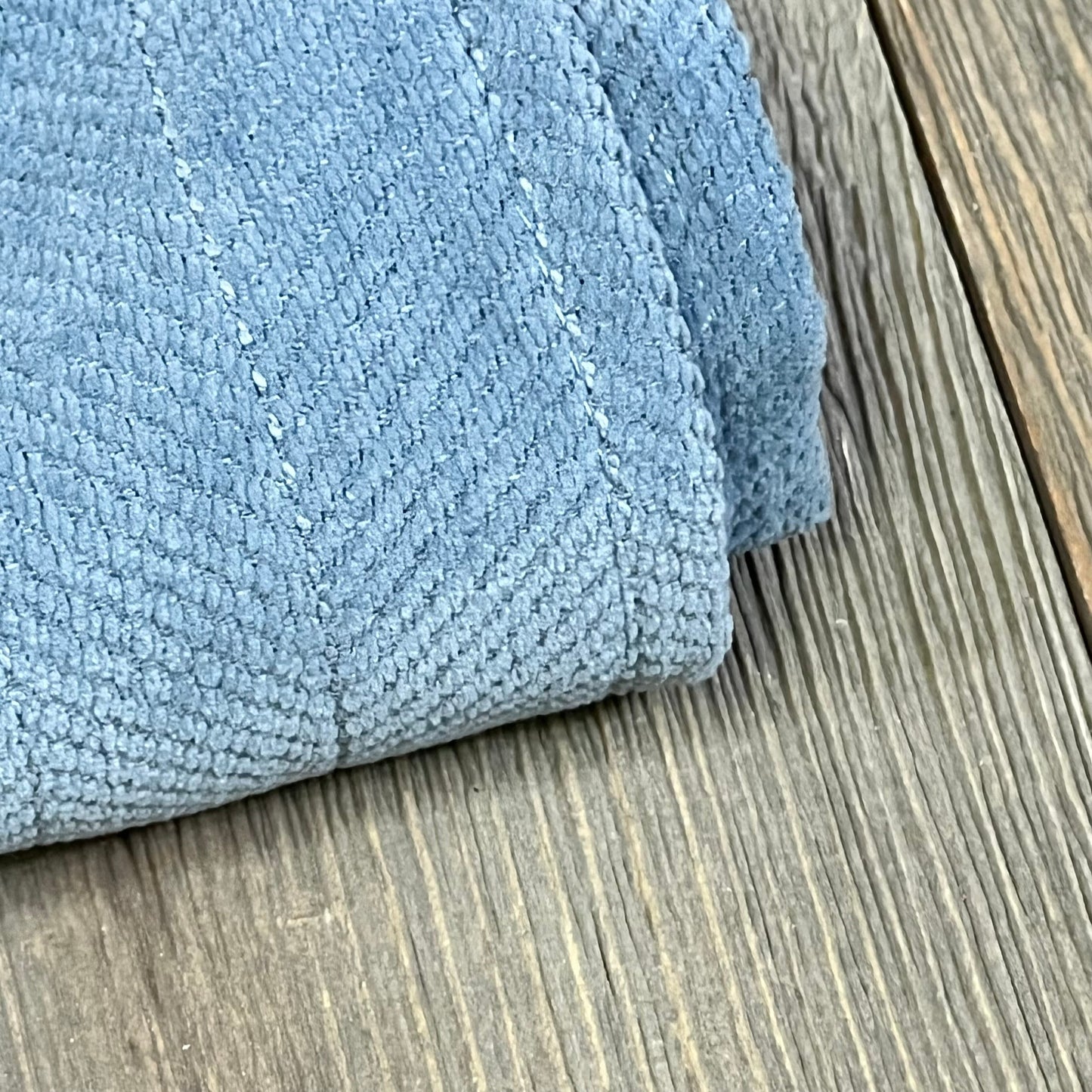 Dusty blue chenille pillow cover with elegant texture, perfect for farmhouse style sofas and living room decor.