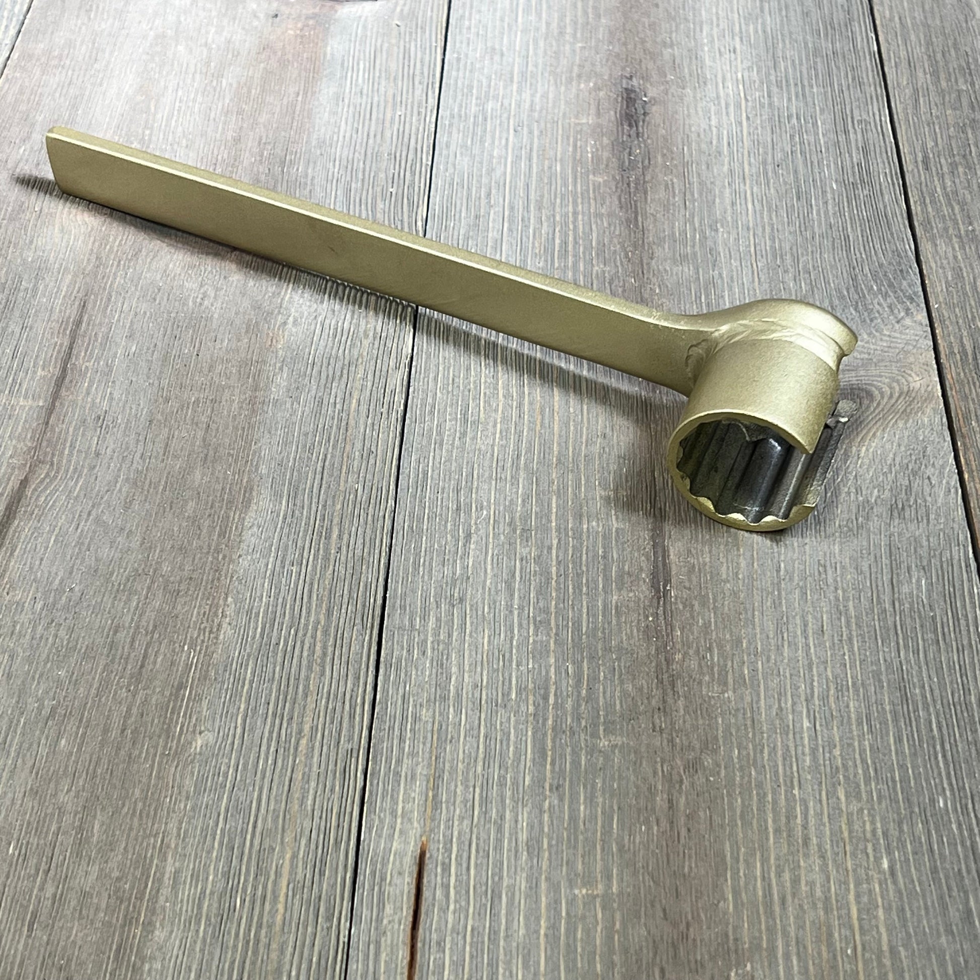 Heavy-duty valve injector pressure regulator tool for Excursion and F-250, 1994-2003, on wooden surface.