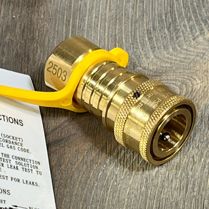 Natural gas hose quick connect fitting with yellow safety cap, perfect for Weber grills and Blackstone griddles.