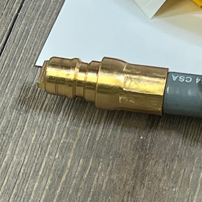Close-up of the brass quick connect fitting on the GasSaf 6FT 3/8" ID natural gas hose for grills and heaters.