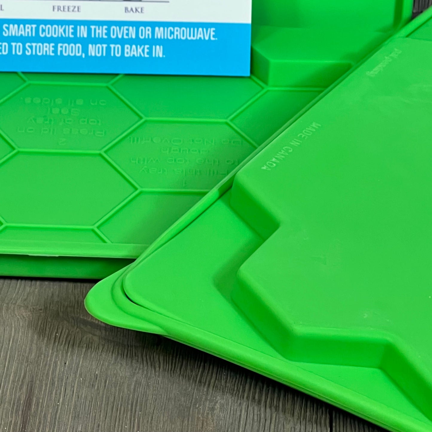 Green Smart Cookie Tray, 2 pack, shown close-up with hexagonal design, perfect for oven or microwave baking.