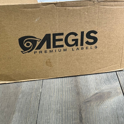 Aegis Adhesives packaging for Brother DK-1209 label replacement, featuring 12 rolls plus frame for QL label printers.