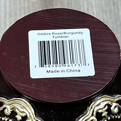 Burgundy base of Popular Bath Ombre Rose Tumbler with barcode and "Made in China" label.
