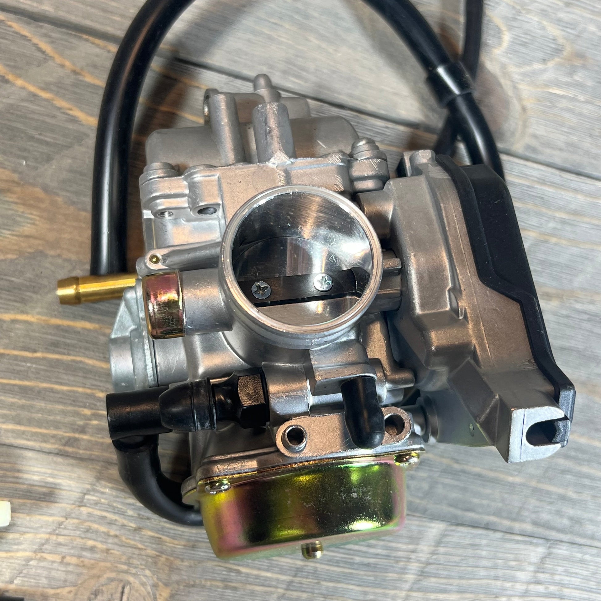 Carburetor for Suzuki Eiger 400 LTF400 Manual 2002-2007, highlighting top view detailing and connections.