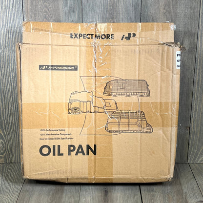 Cardboard box packaging for Premium Transmission Oil Pan Sump, showing product illustration and features for Toyota models.