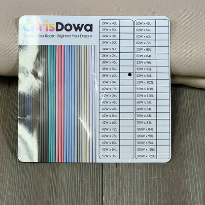 ChrisDowa blackout curtains size chart displayed on a wooden surface, showcasing various dimensions and color options.