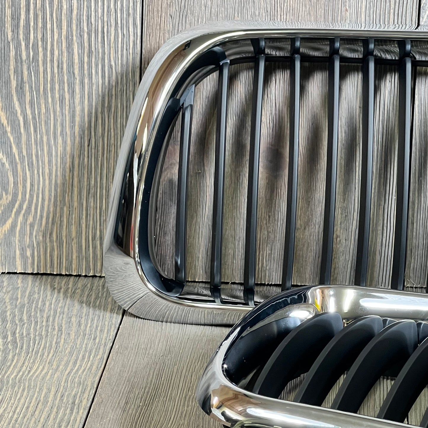 Black chrome kidney grille for '97-'99 BMW 3 Series E36, showcasing sleek design and premium finish.