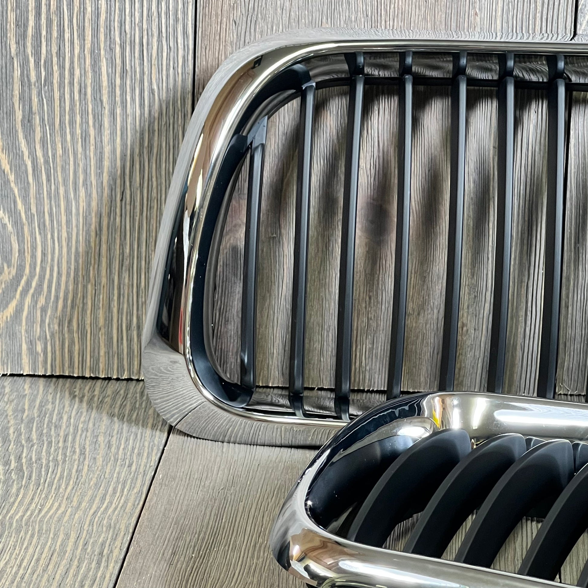Black chrome kidney grille for '97-'99 BMW 3 Series E36, showcasing sleek design and premium finish.