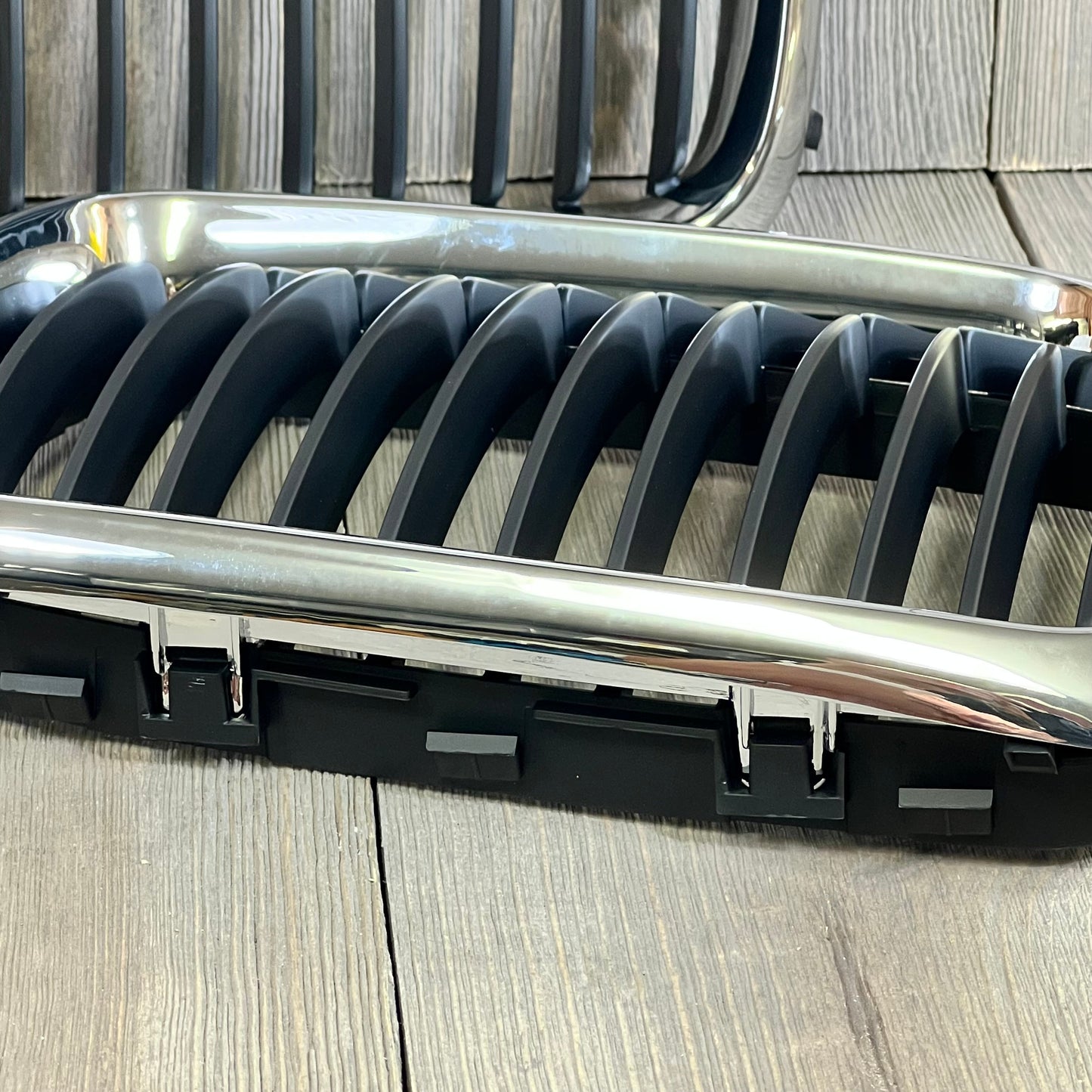 Black chrome kidney grille for '97-'99 BMW 3 Series E36, showcasing sleek design and durable finish.