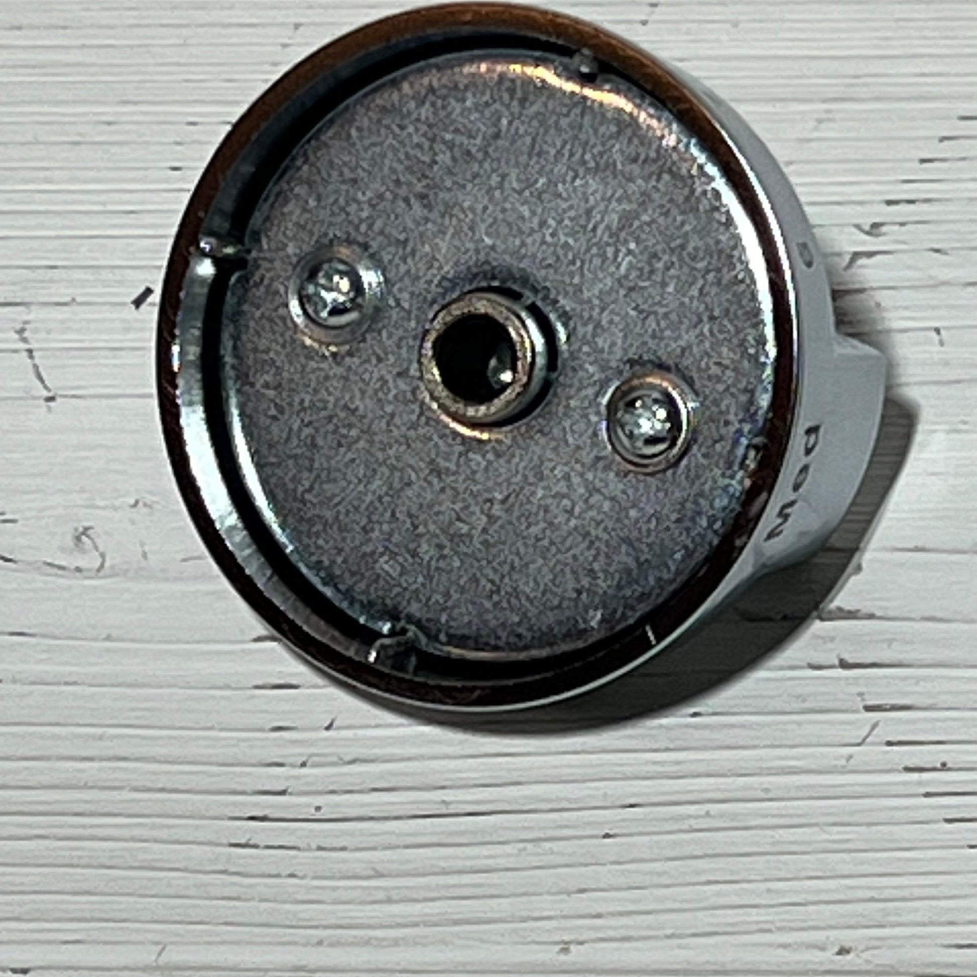 Stainless steel back of Samsung stove knob replacement, compatible with models NE63T8111SS/AA and NE63T8311SS/AA.