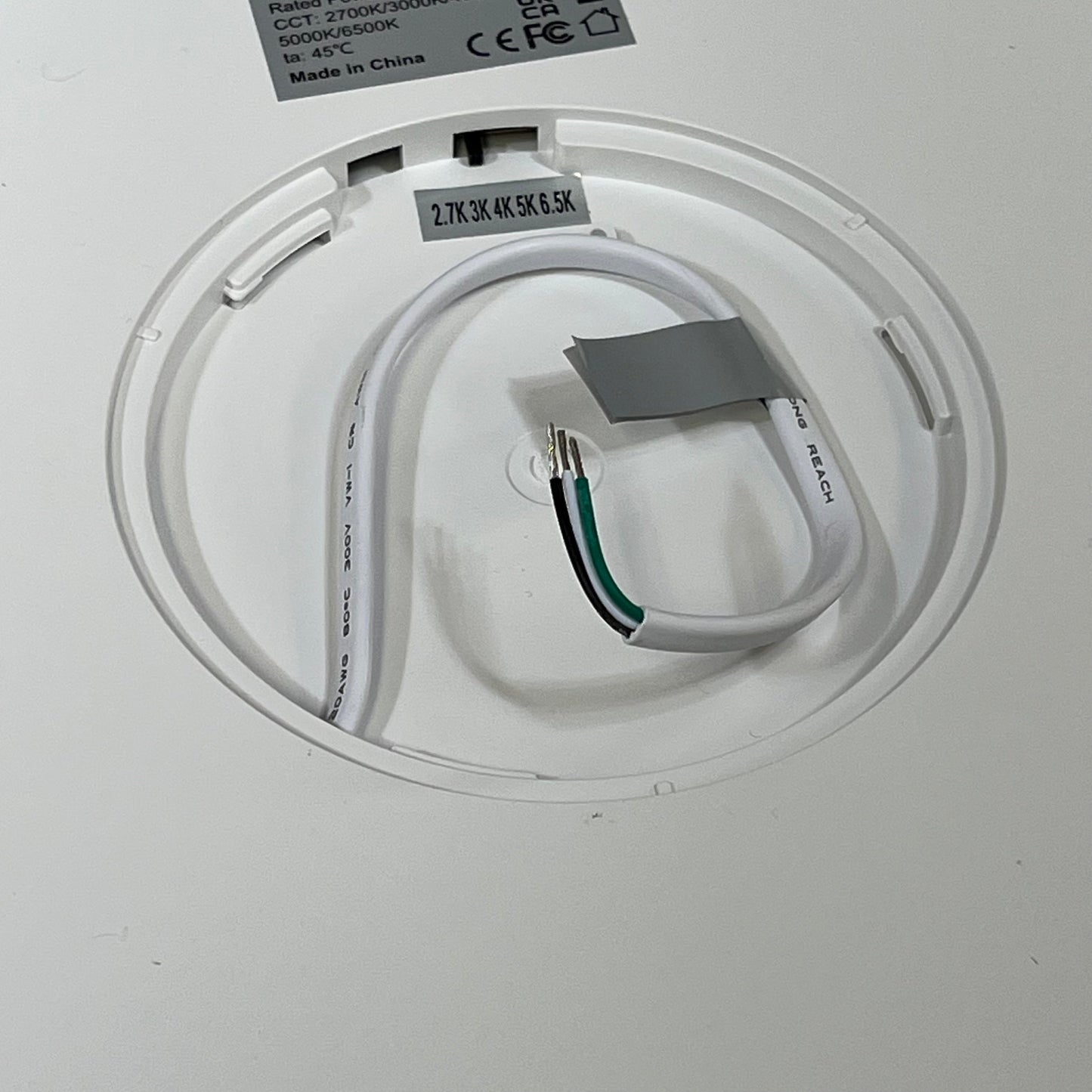 LED flush mount ceiling light fixture wiring, showing 5 color temperature settings from 2700K to 6500K, slim 0.67-inch design.