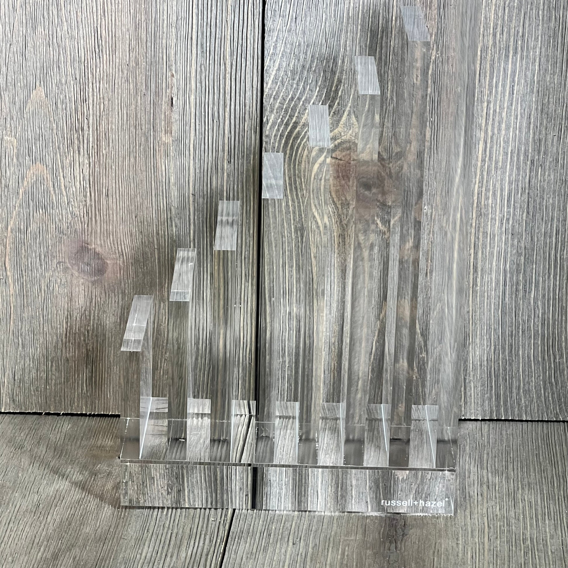Clear acrylic collator and bookend by russell+hazel, perfect for organizing books, 5x8x2.5 inches, modern design.