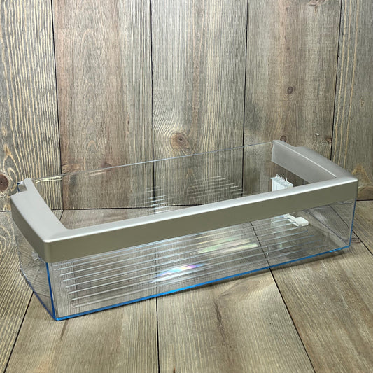 Transparent refrigerator door shelf bin compatible with Bosch 00673122, featuring durable plastic and sleek design.