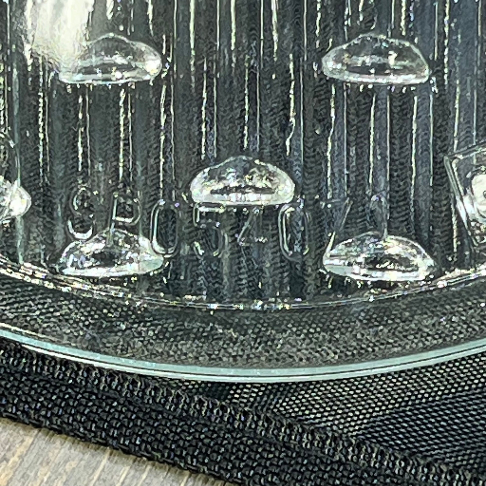Clear tempered lens for Hayward underwater lights, model SPX0540Z1, showcasing intricate texture and design.