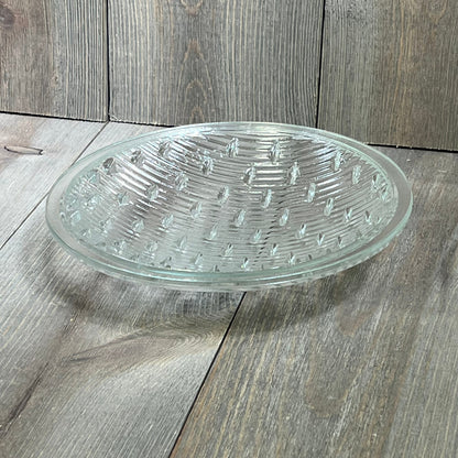 Tempered clear lens for Hayward underwater lights, 7-9/16 inches in diameter, resting on a wooden surface.