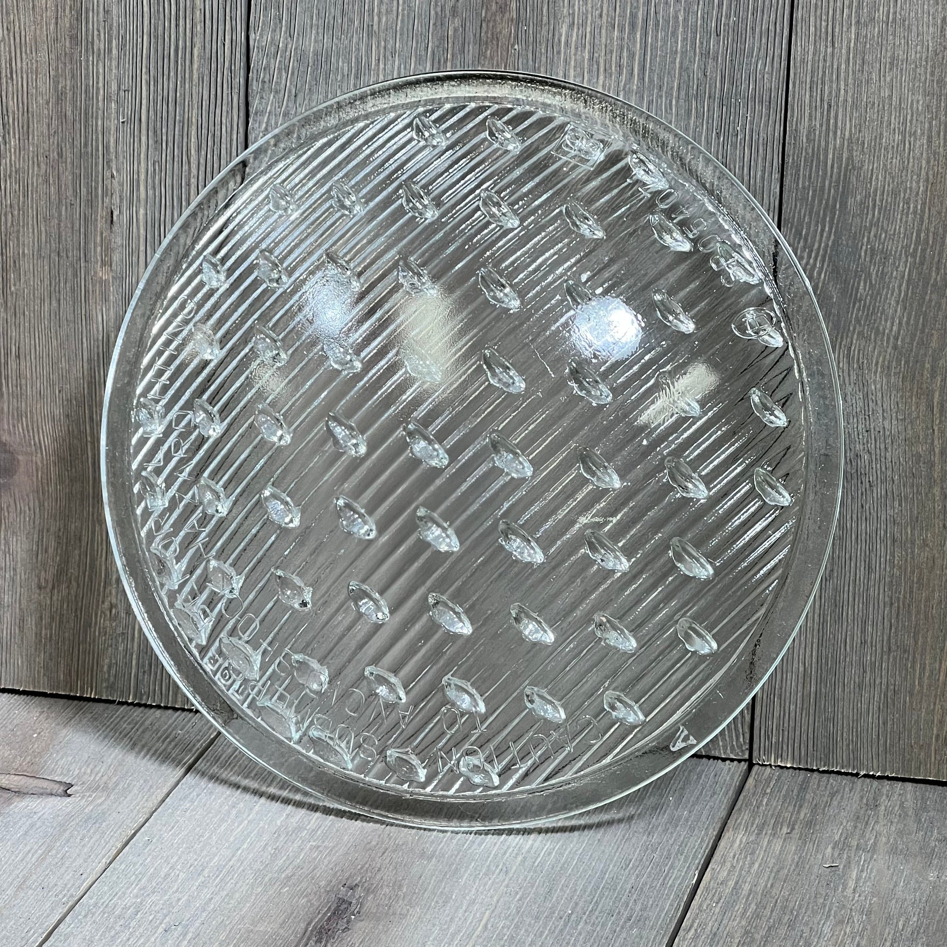 Clear tempered lens replacement for Hayward underwater lights, 7-9/16 inch diameter, textured surface for optimal light diffusion.