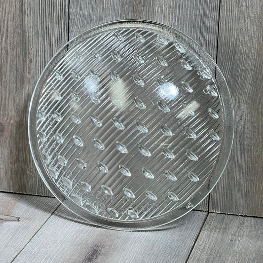 Clear tempered lens replacement for Hayward underwater lights, 7-9/16 inch diameter, textured surface for optimal light diffusion.